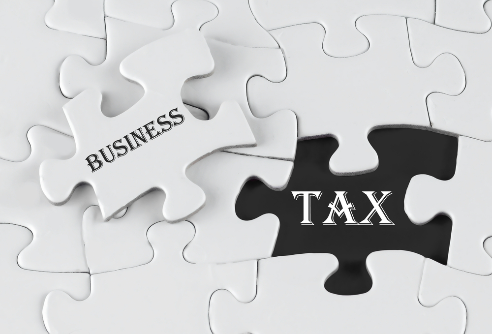 Business-Tax-as-Two-Puzzle-Pieces