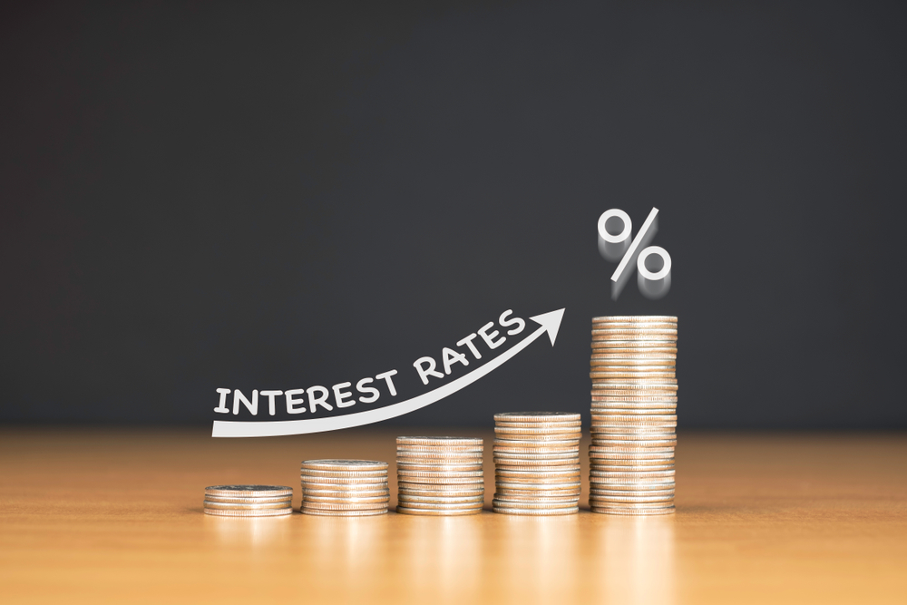 Interest rates rising graph with dimes